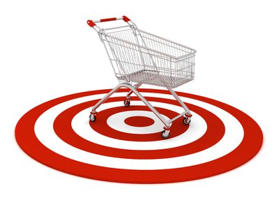 Shopping cart above target symbol.