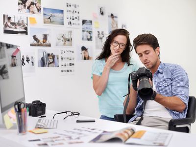 Photographers at desk