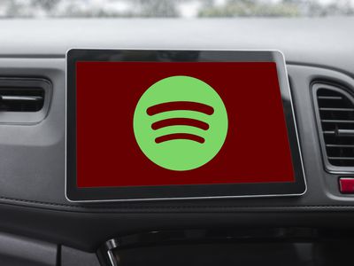 Spotify logo with red background on car head unit